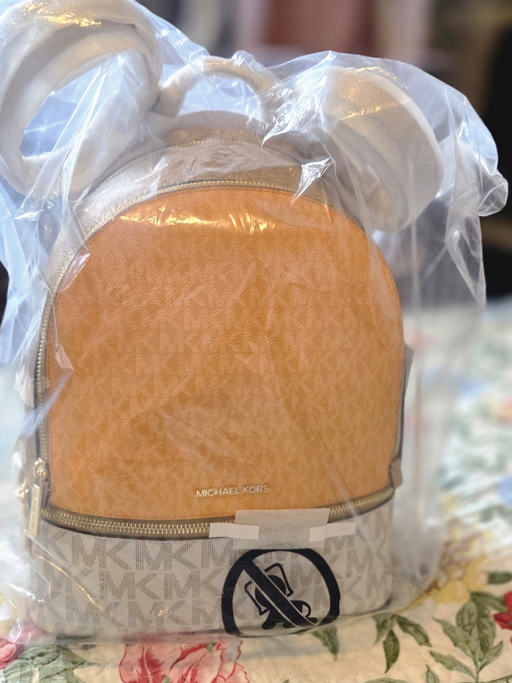Michael Kors Orange and Cream Logo Dome Mini Backpack